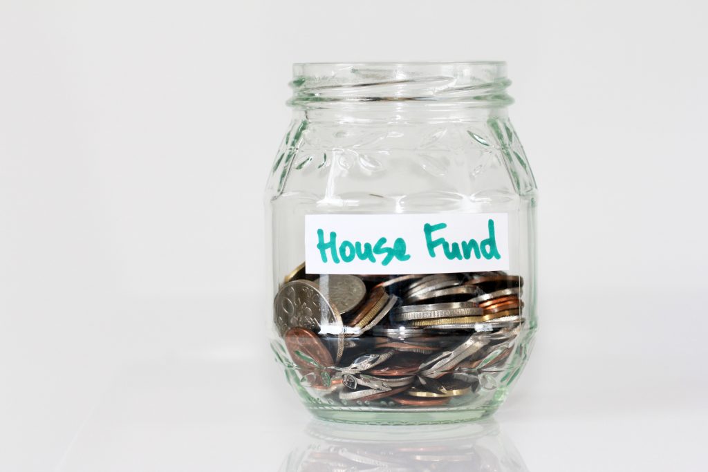 collecting coins in house fund jar