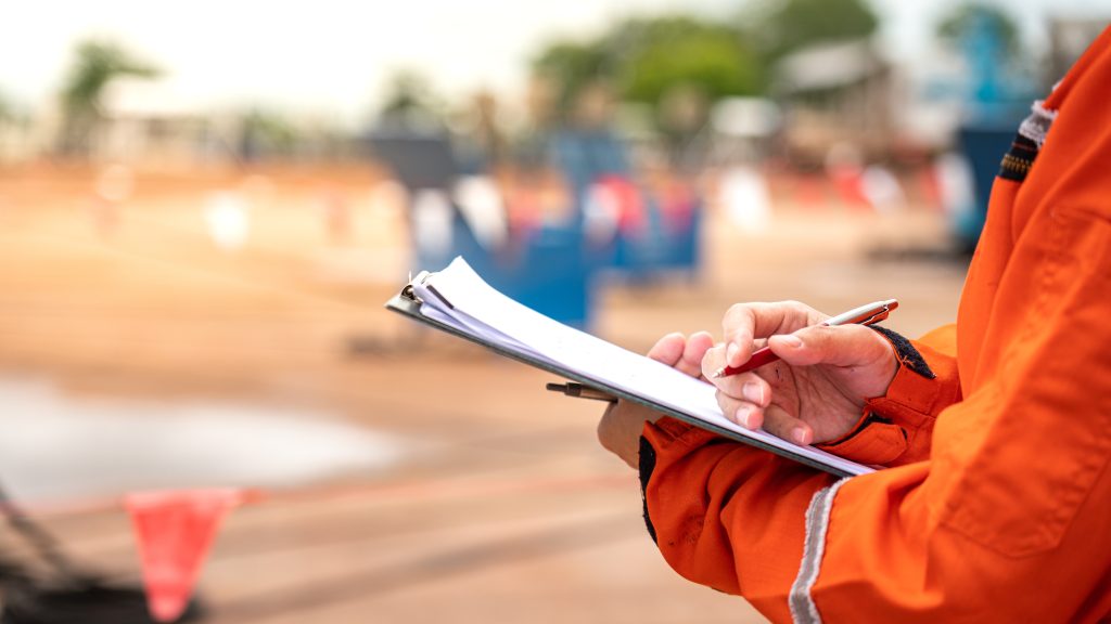 person completing a site inspection