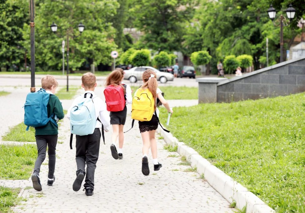 pupils running in park