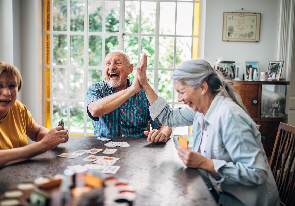 retirees playing cards